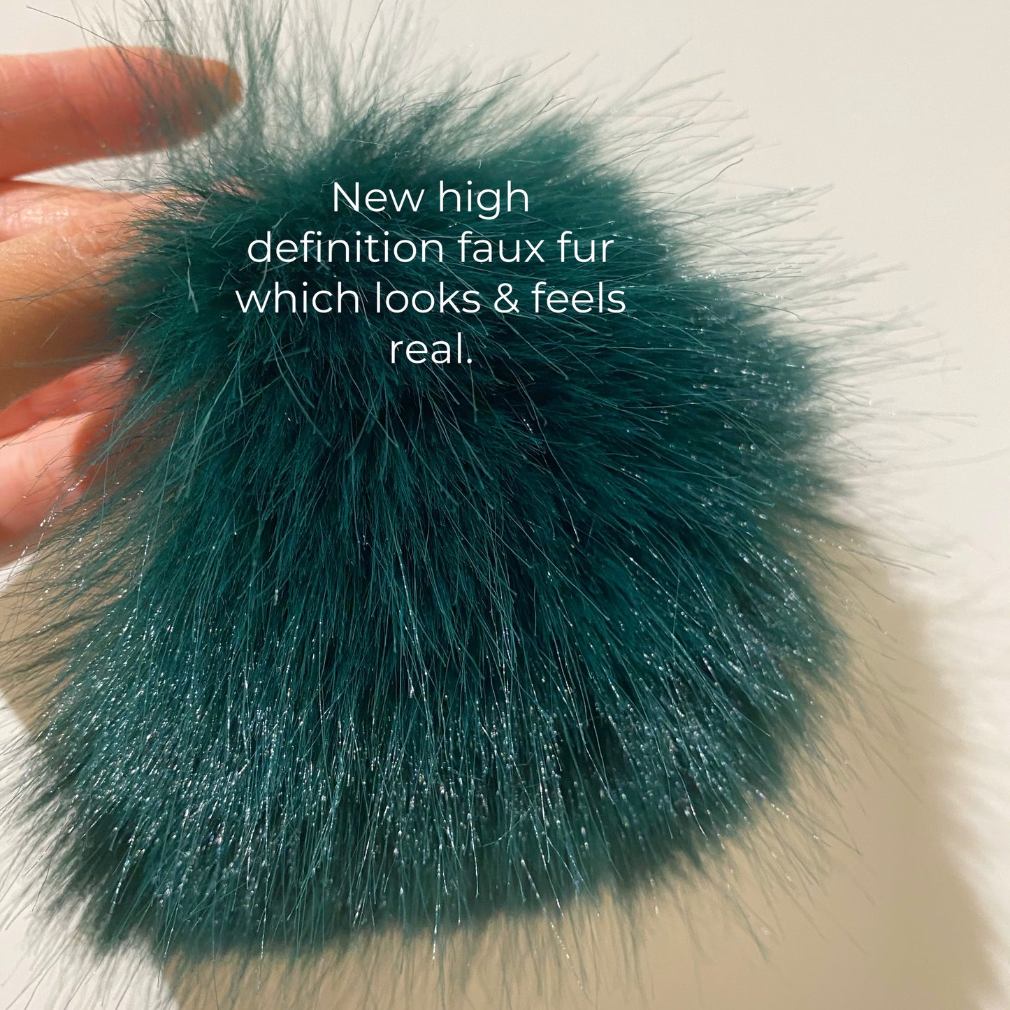 Chic emerald green faux fur jacket with five horizontal rows