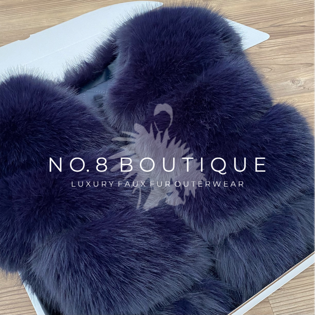 Chic navy faux fur jacket featuring classic 5 row design