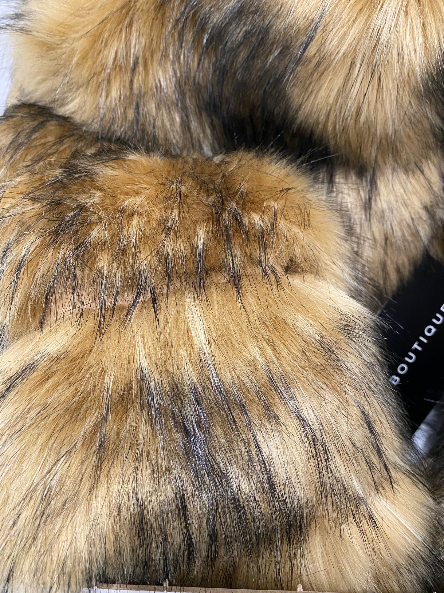 Chic raccoon patterned faux fur jacket with three cropped rows