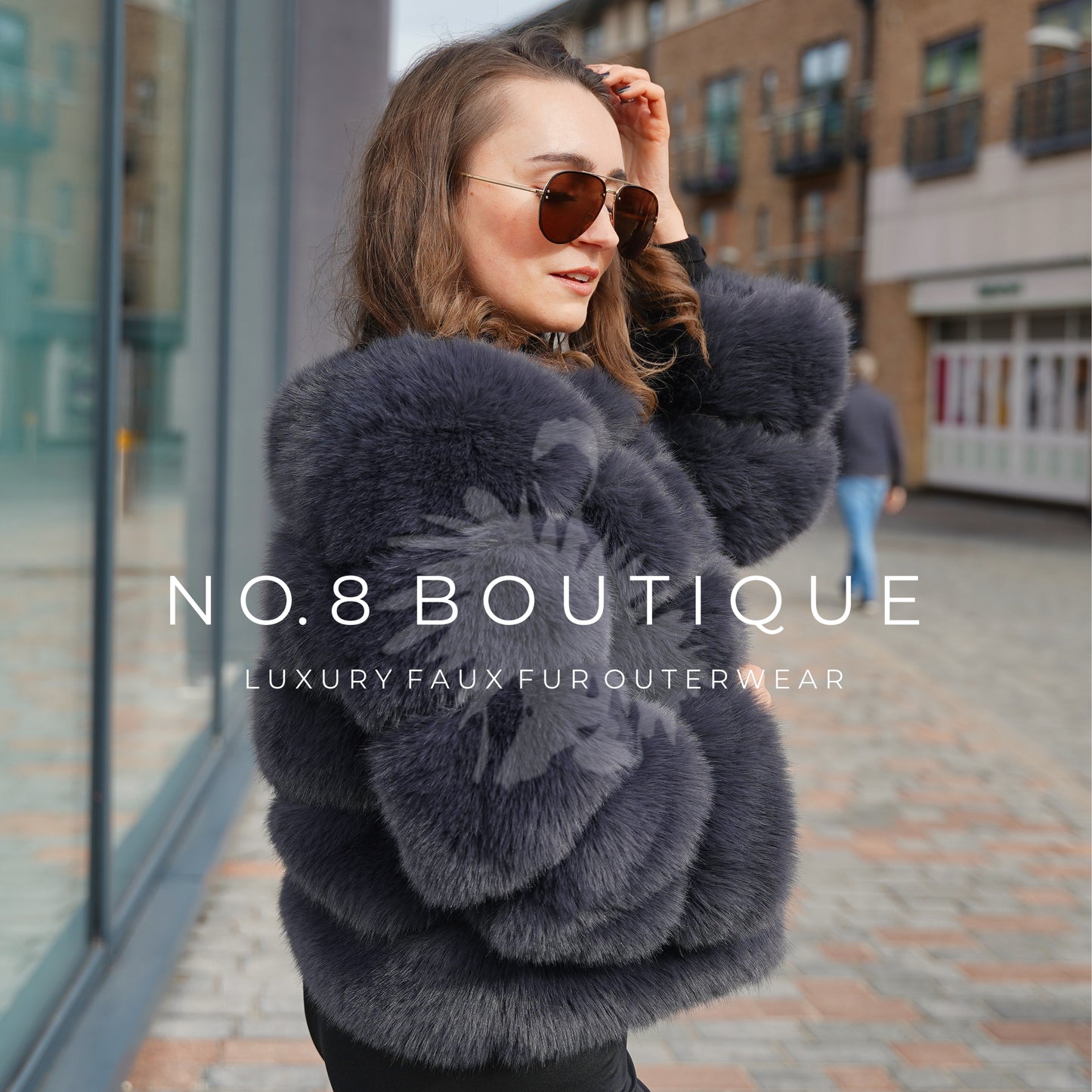 Contemporary charcoal grey faux fur jacket with 5 plush rows