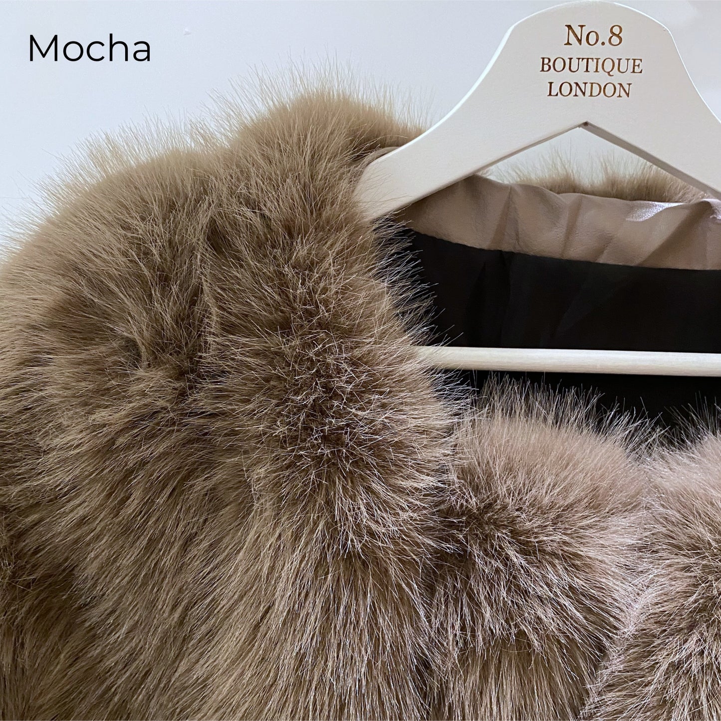 Contemporary straight row faux fur jacket from Vienna