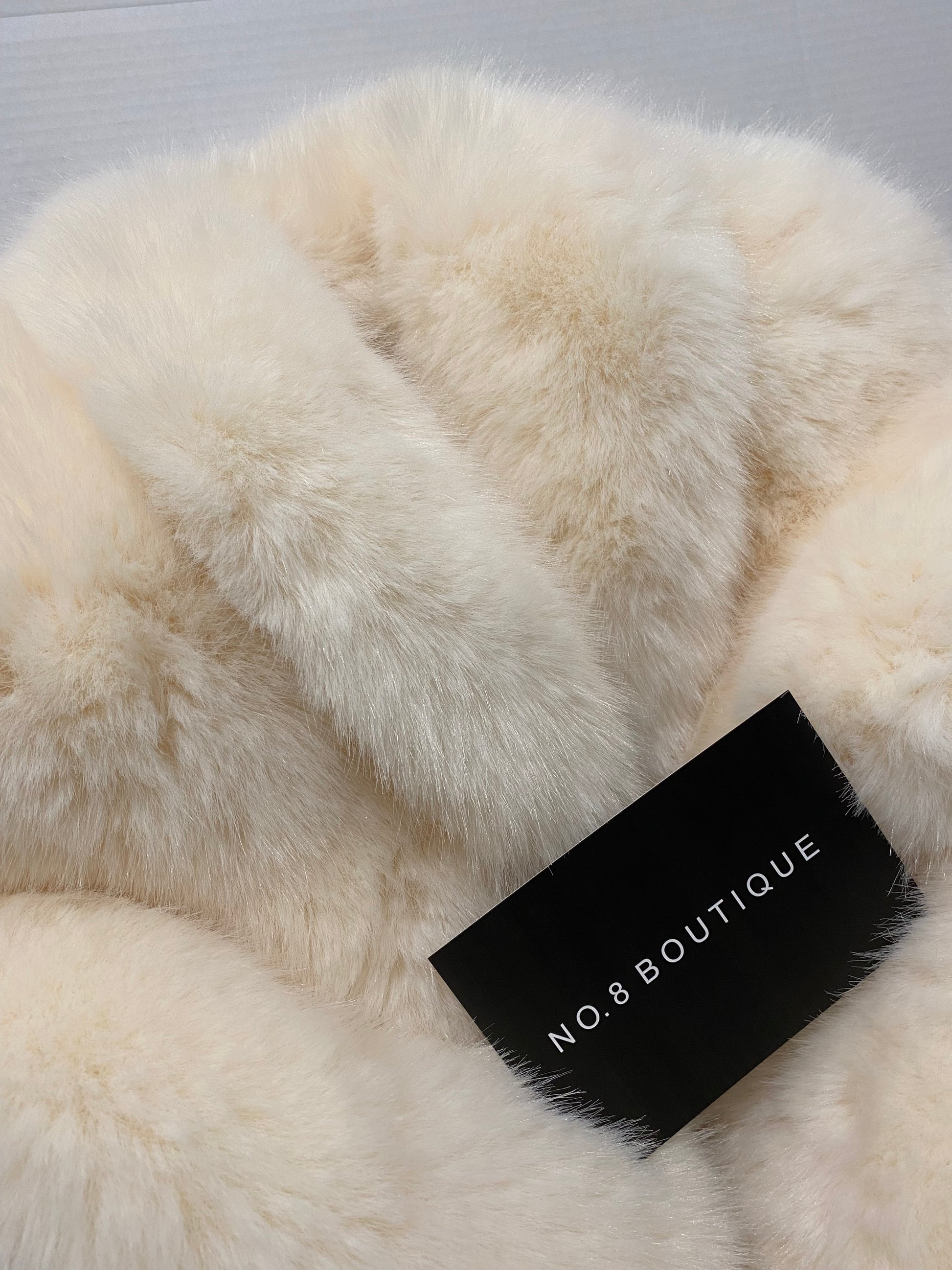 Cozy mini faux fur jacket with a cropped and snug fit