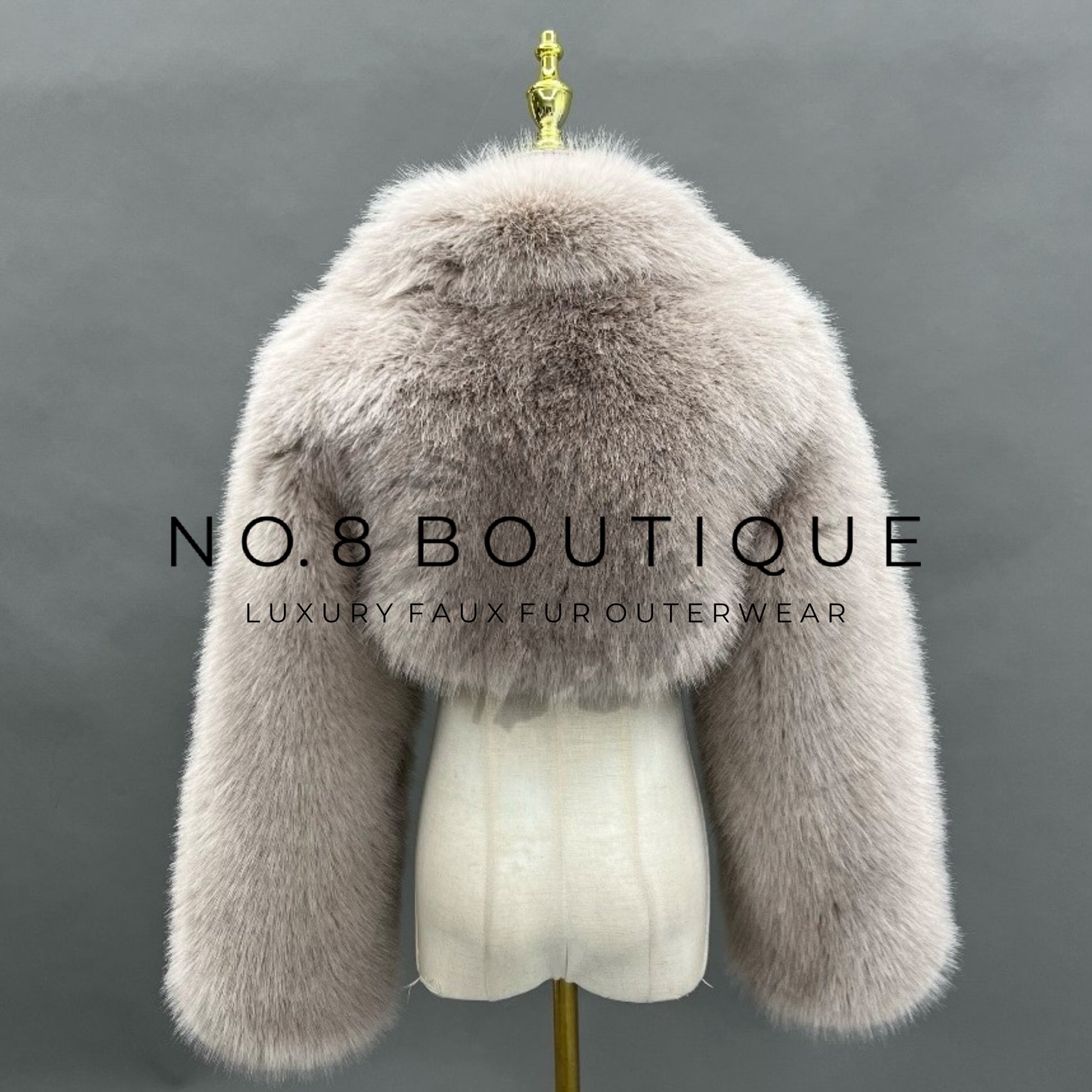 Designer mini faux fur jacket with modern cropped hem