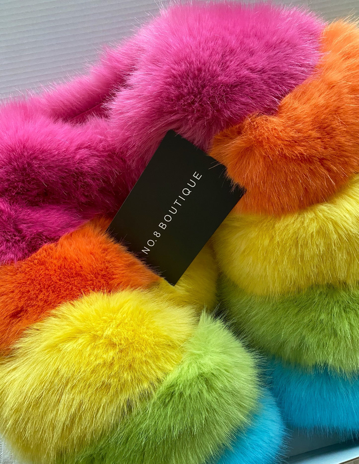 Eye-catching rainbow multicolour faux fur jacket