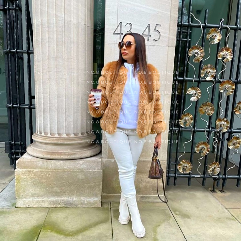 Fashion-forward Vienna jacket with uniform straight faux fur rows