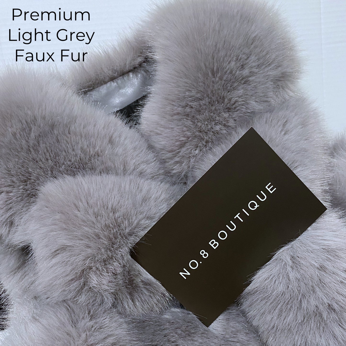 Ivory faux fur gilet with six rows