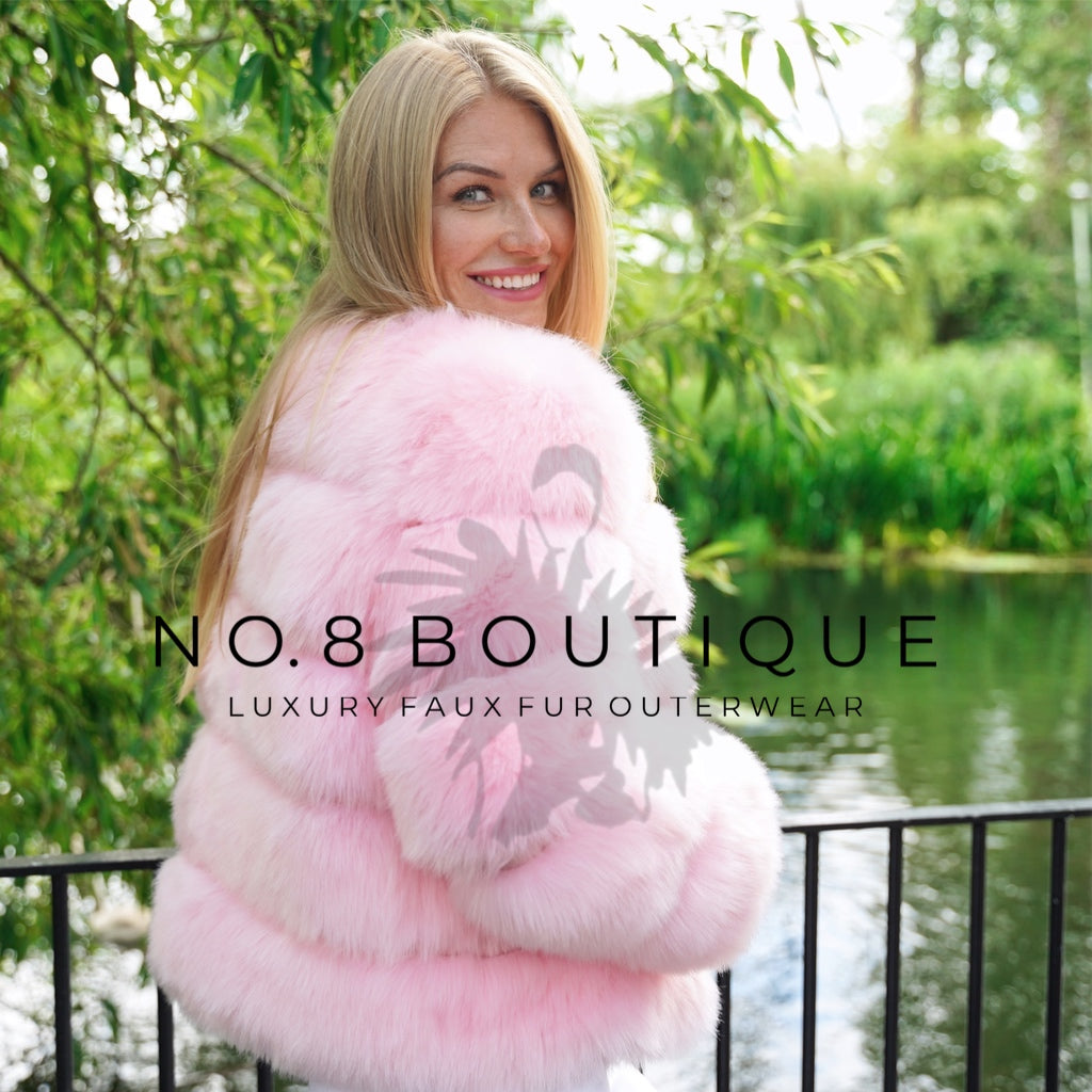 Luxurious baby pink faux fur jacket structured in five rows
