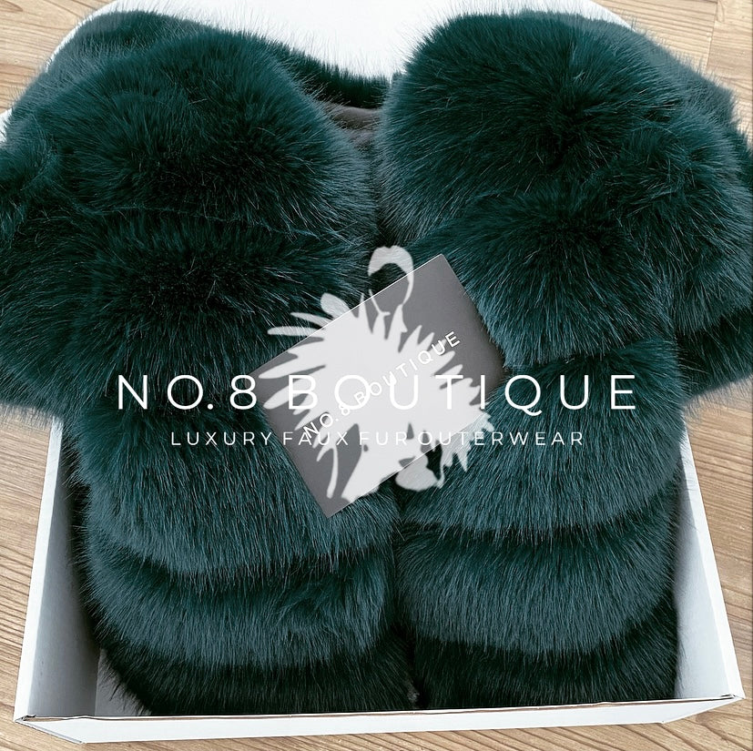 Luxurious emerald green faux fur jacket with 5-row design