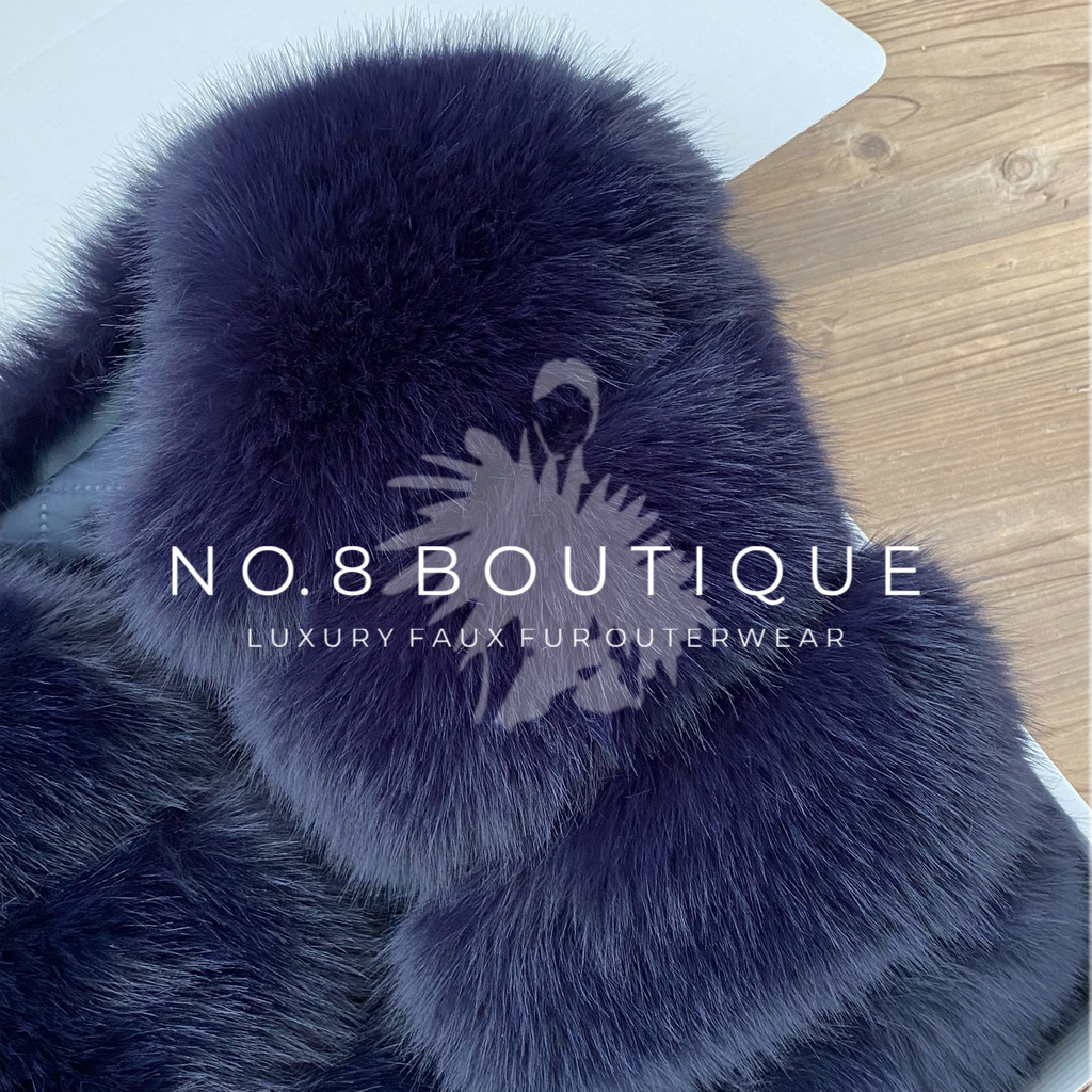 Luxurious navy faux fur jacket with five structured rows