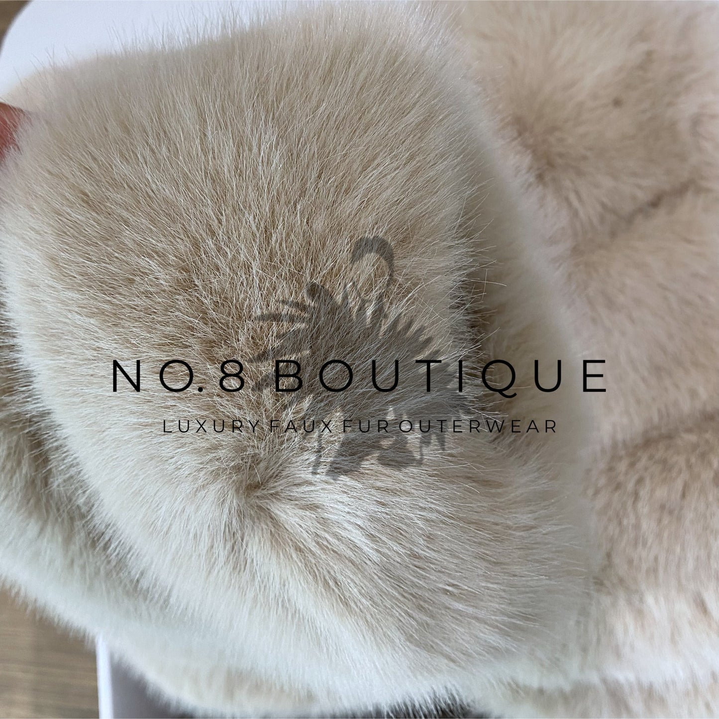 Modern beige faux fur jacket