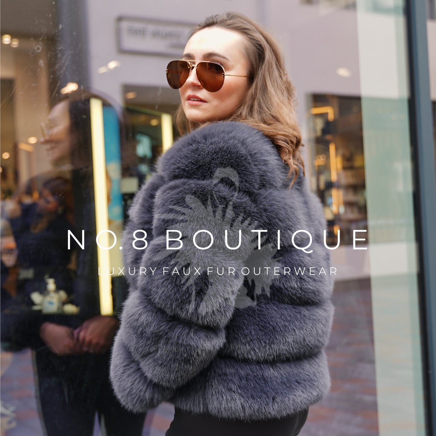 Modern charcoal grey faux fur jacket with clean 5-row detail