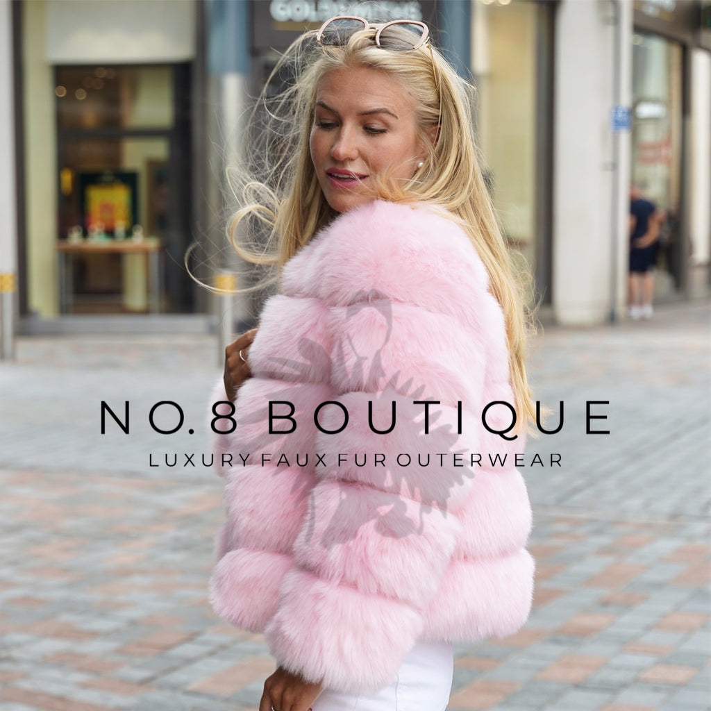 Soft baby pink faux fur jacket with five horizontal rows