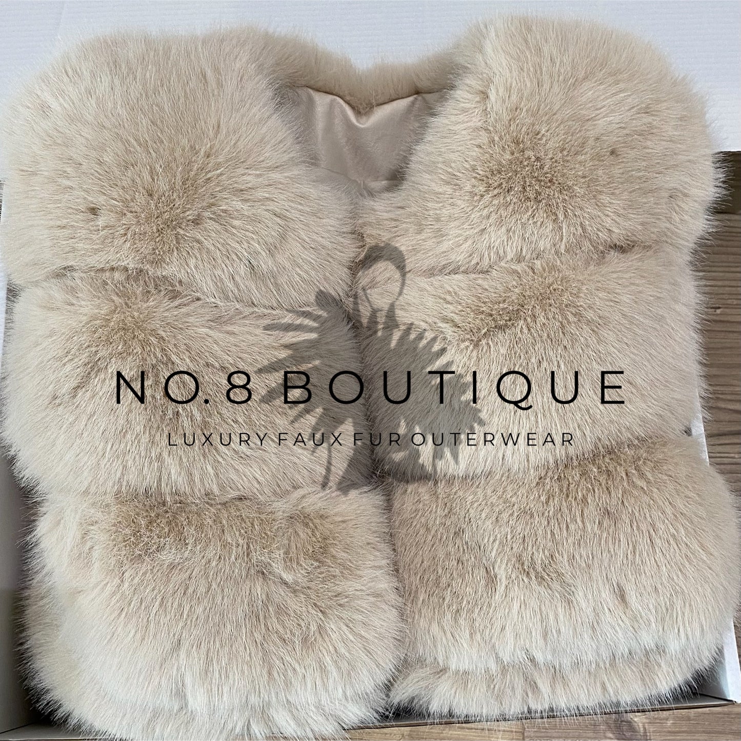 Soft beige faux fur jacket with distinctive five rows