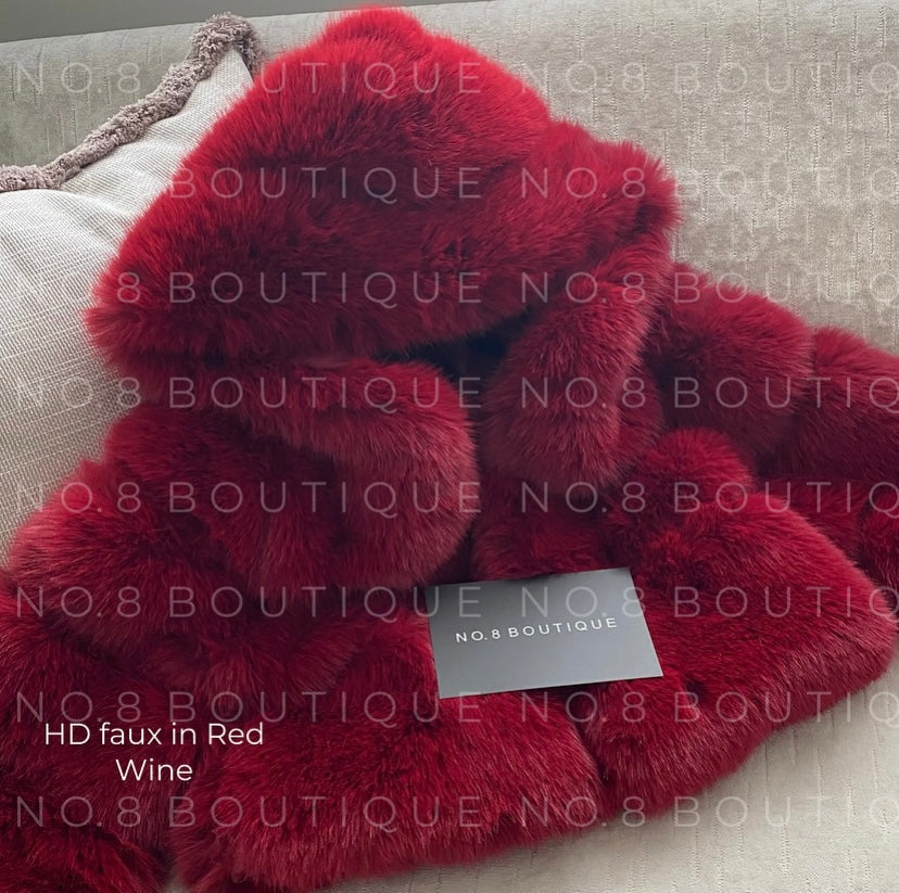 Stylish HD faux fur hooded jacket in a cropped style