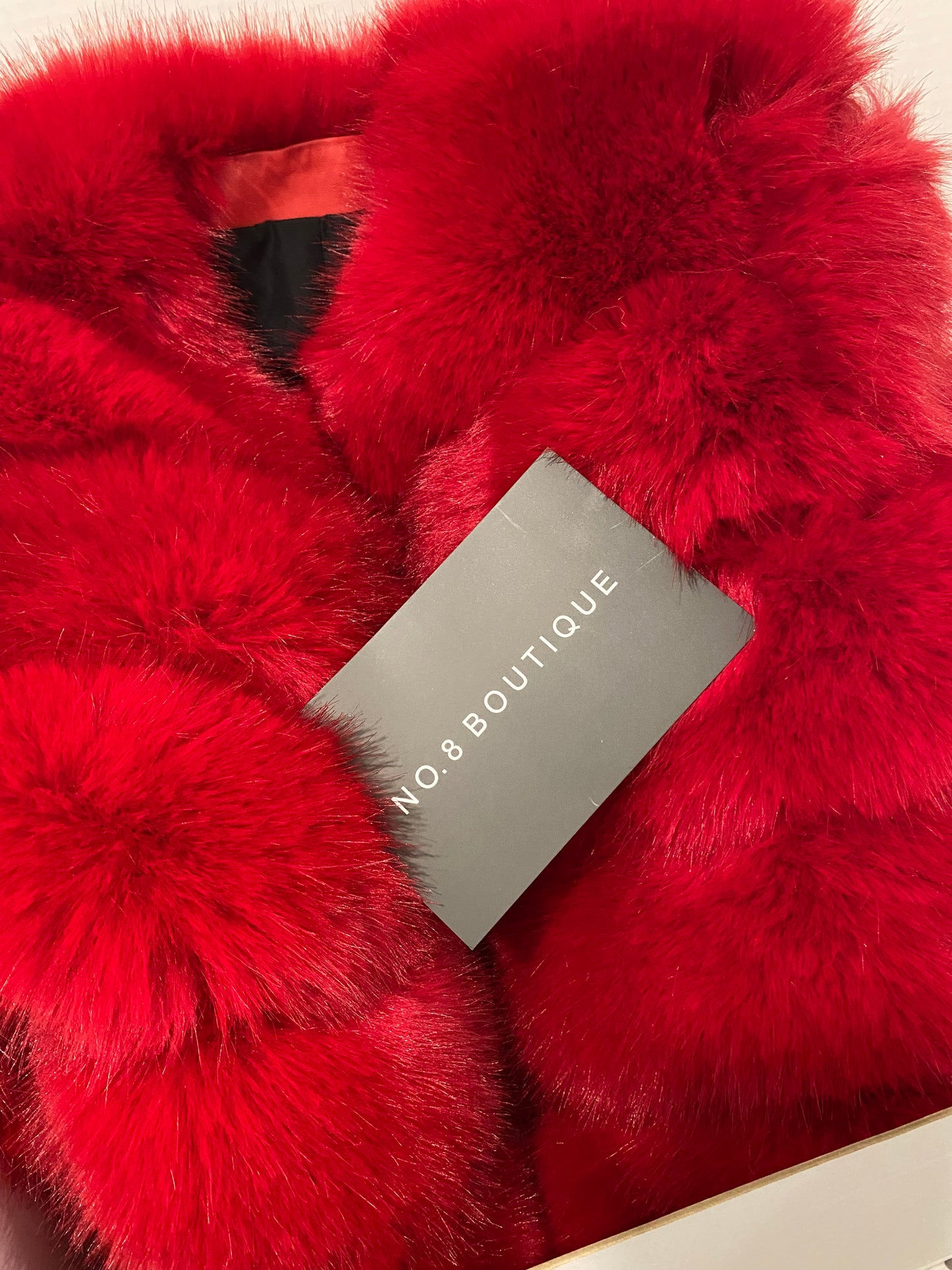 Trendy classic red faux fur jacket with a minimalist 5-row design