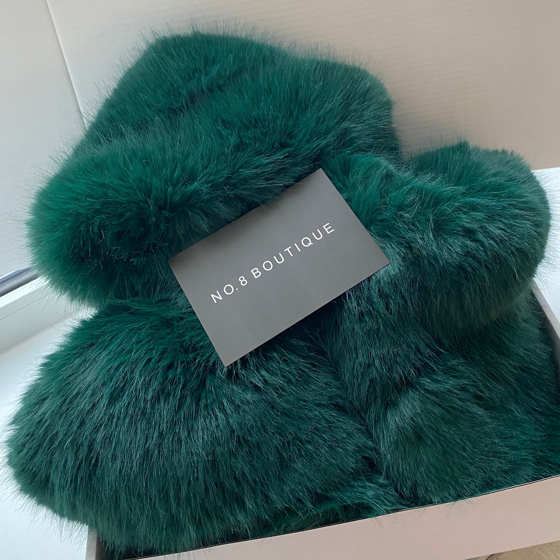 Trendy HD faux fur cropped jacket featuring a hood