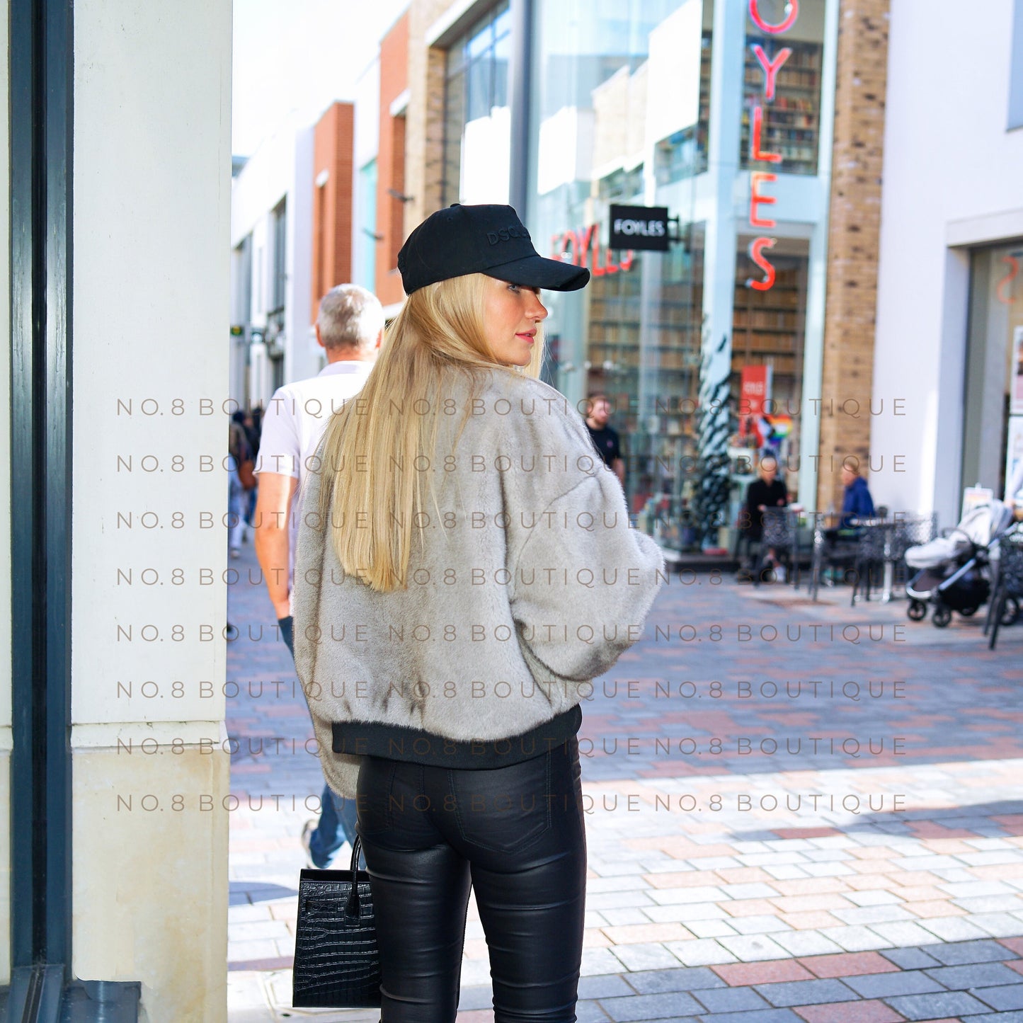 Elegant oversize bomber jacket crafted in soft faux mink