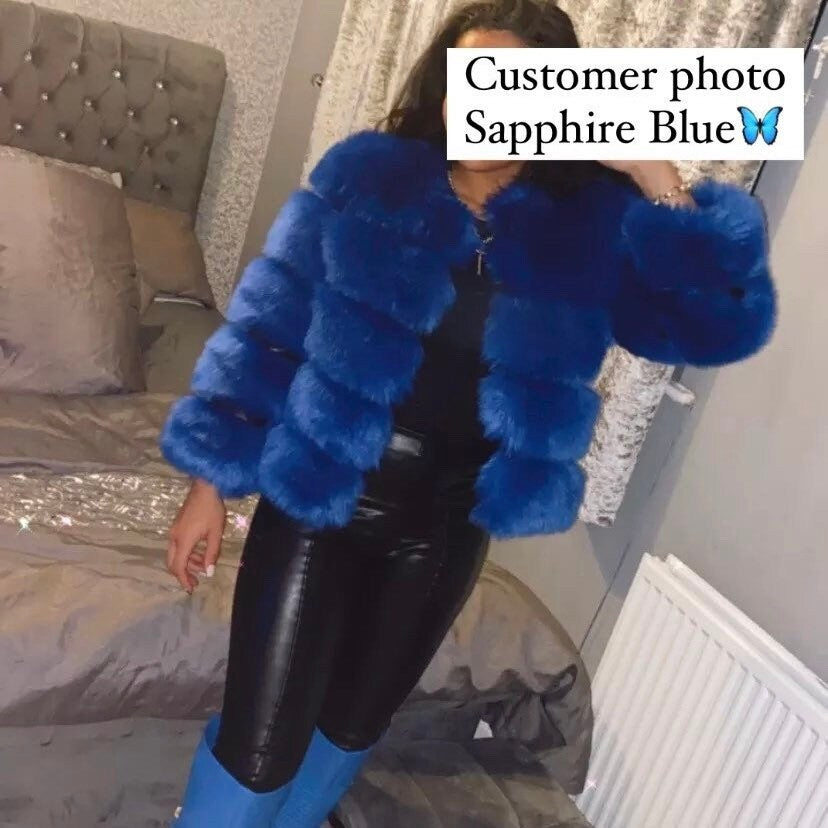 Elegant sapphire blue faux fur jacket with five horizontal rows