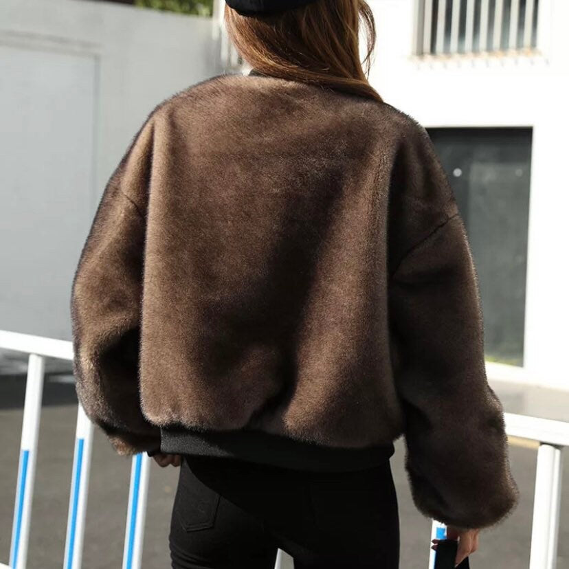 Modern oversize bomber in plush faux mink