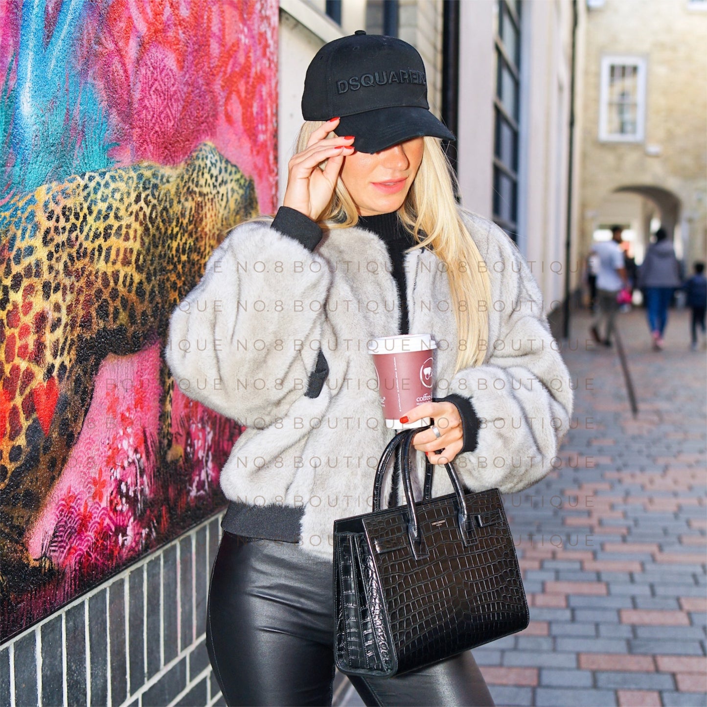 Street style oversize faux mink bomber for a bold look