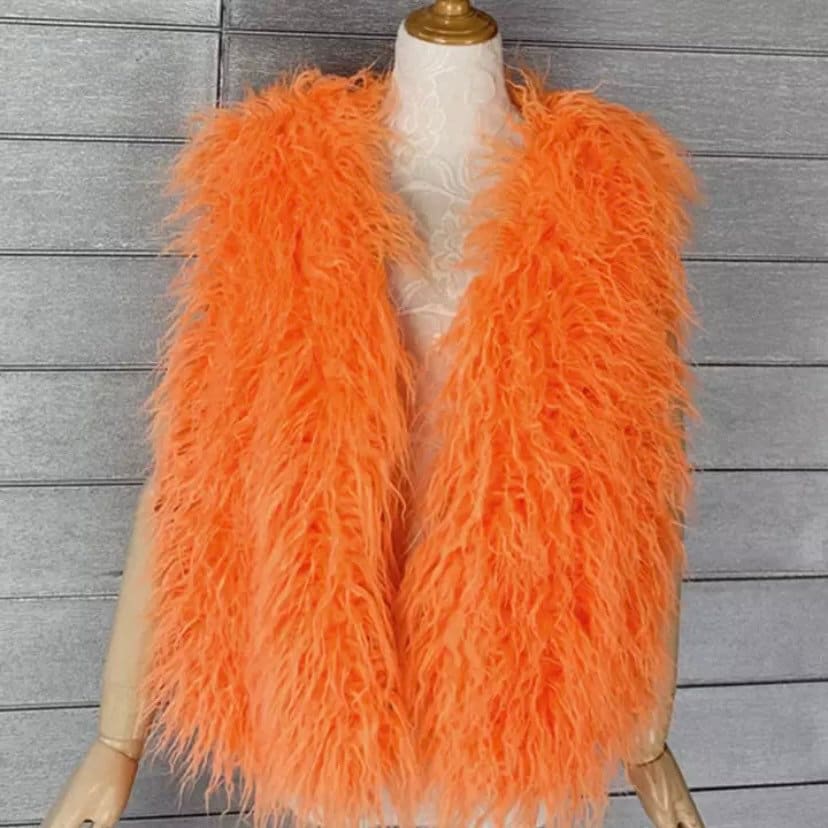 Stylish long gilet featuring plush shaggy Mongolian faux fur