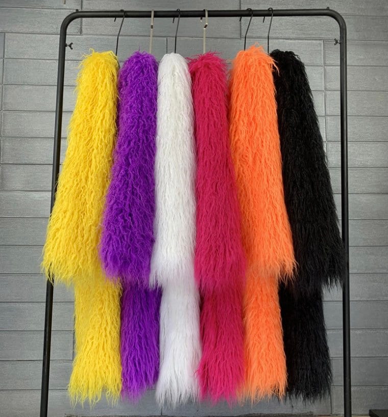 Trendy long shaggy faux fur coat in Mongolian style