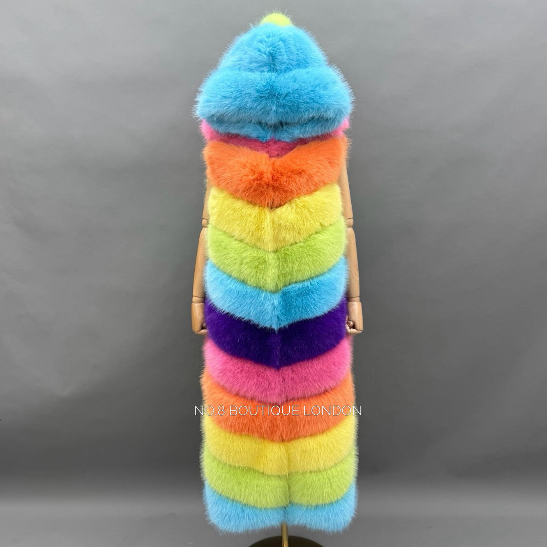 Women's hooded faux fur gilet with 12 row design