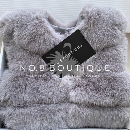 Chic classic faux fur jacket in light grey with 5 rows