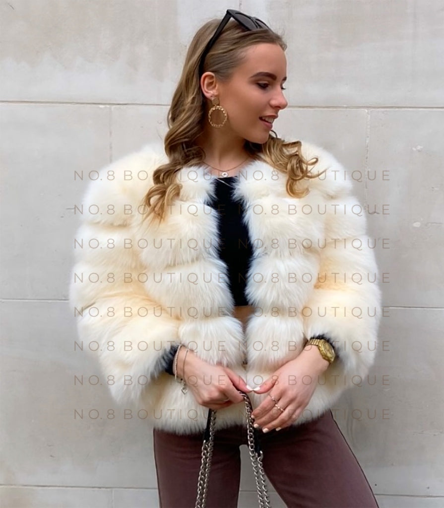 Classic cream faux fur coat with five elegant rows