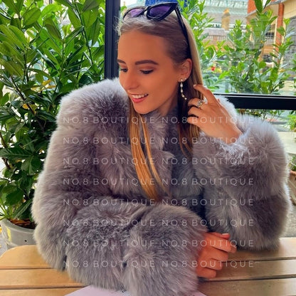 Contemporary light grey faux fur jacket with five plush rows