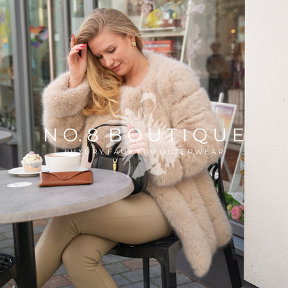 Elegant Vienna faux fur coat with straight rows for a sleek look