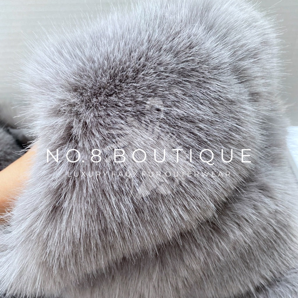 Fashion-forward light grey faux fur jacket with 5 rows