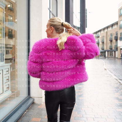 Fashion-forward magenta pink faux fur jacket with 5 row pattern