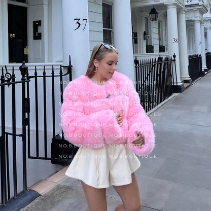 Luxurious cropped faux fur jacket in pink with 3 rows