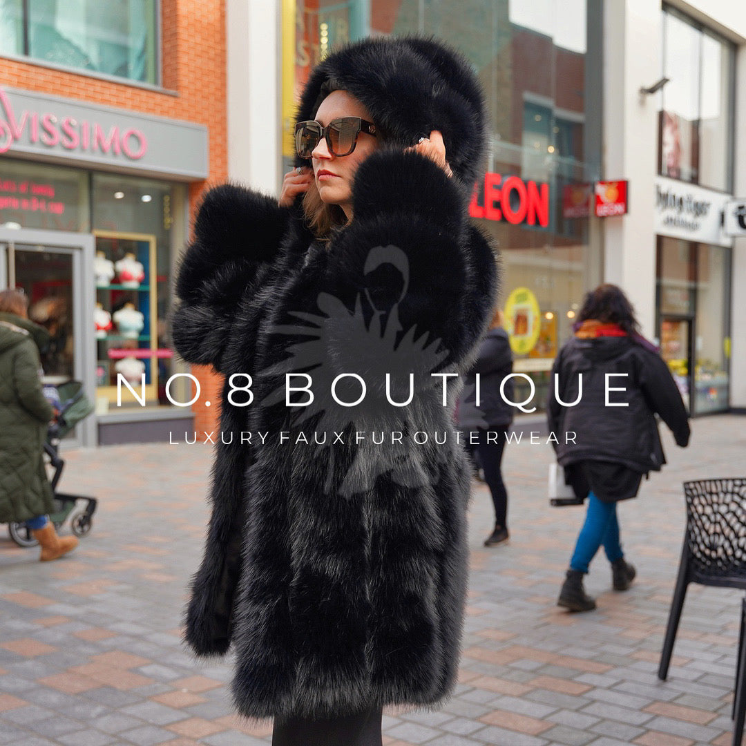 Luxurious hooded long faux fur coat in Vienna style