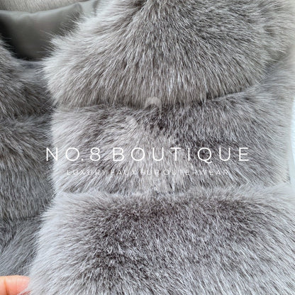 Luxurious light grey faux fur jacket with classic 5 row design