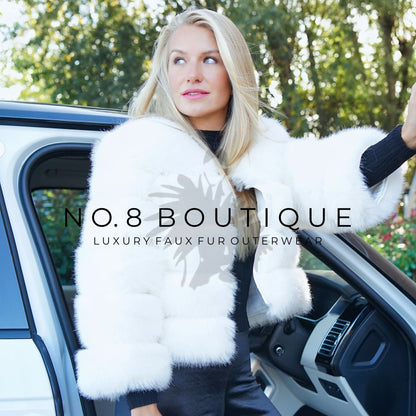 Luxurious white faux fur jacket with classic 5 row design