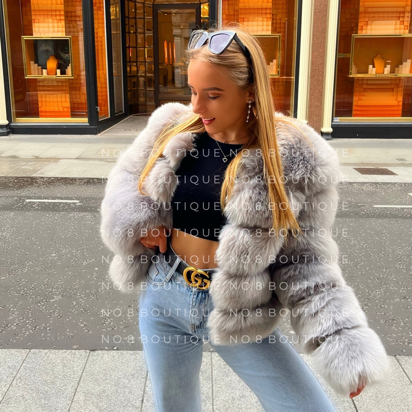 Modern light grey faux fur jacket with a minimalist 5 row design