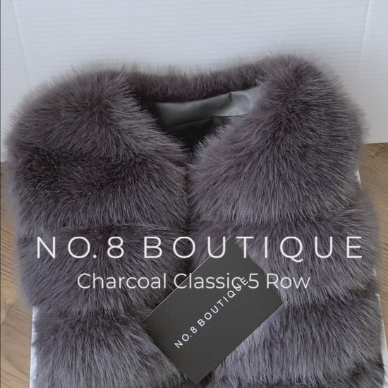 Sophisticated charcoal grey faux fur jacket with five horizontal rows