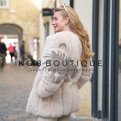 Runway-ready Vienna faux fur coat with elegant straight rows