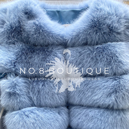 Stylish baby blue faux fur with classic design