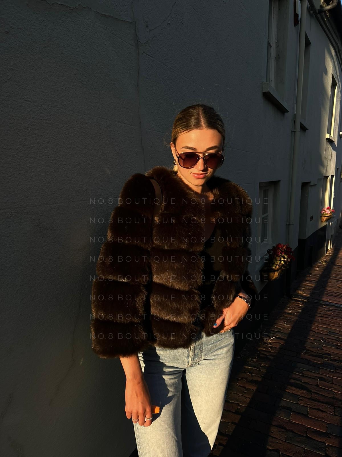 Stylish coffee brown faux fur jacket with elegant five rows