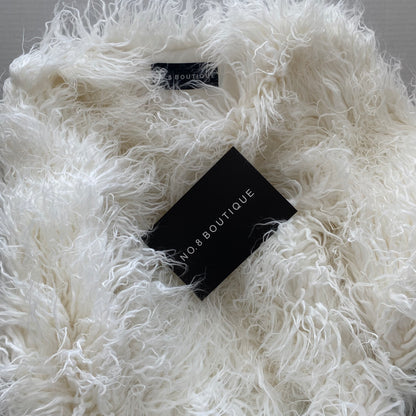 Versatile shaggy Mongolian faux fur jacket for stylish layering