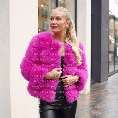 Vibrant magenta pink faux fur jacket with five horizontal rows