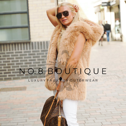 Vienna hooded gilet with straight rows of faux fur for a bold statement