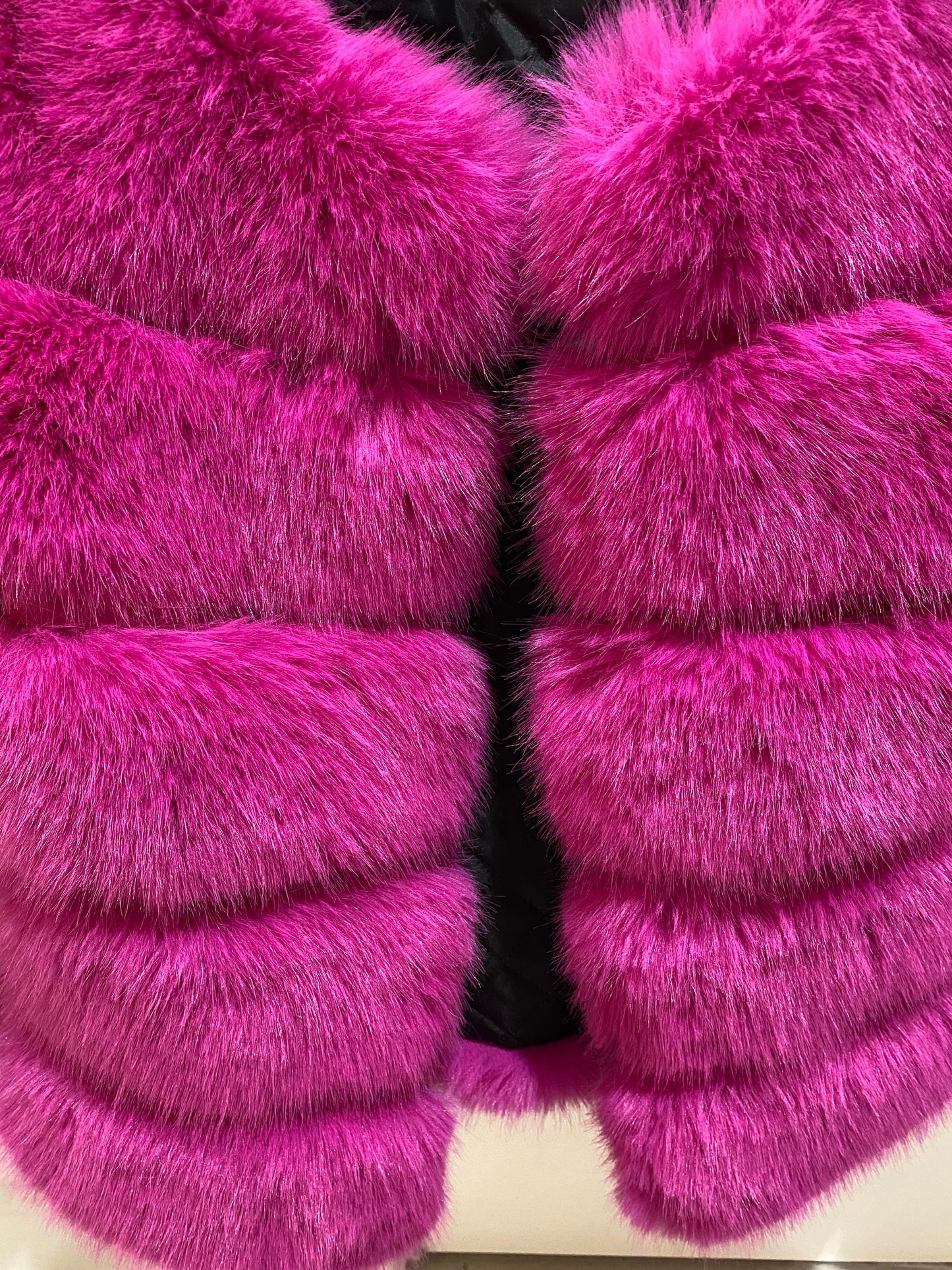 Bold classic magenta pink faux fur jacket with five plush rows