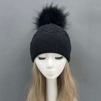 Cableknit cashmere/angora faux fur bobble hat