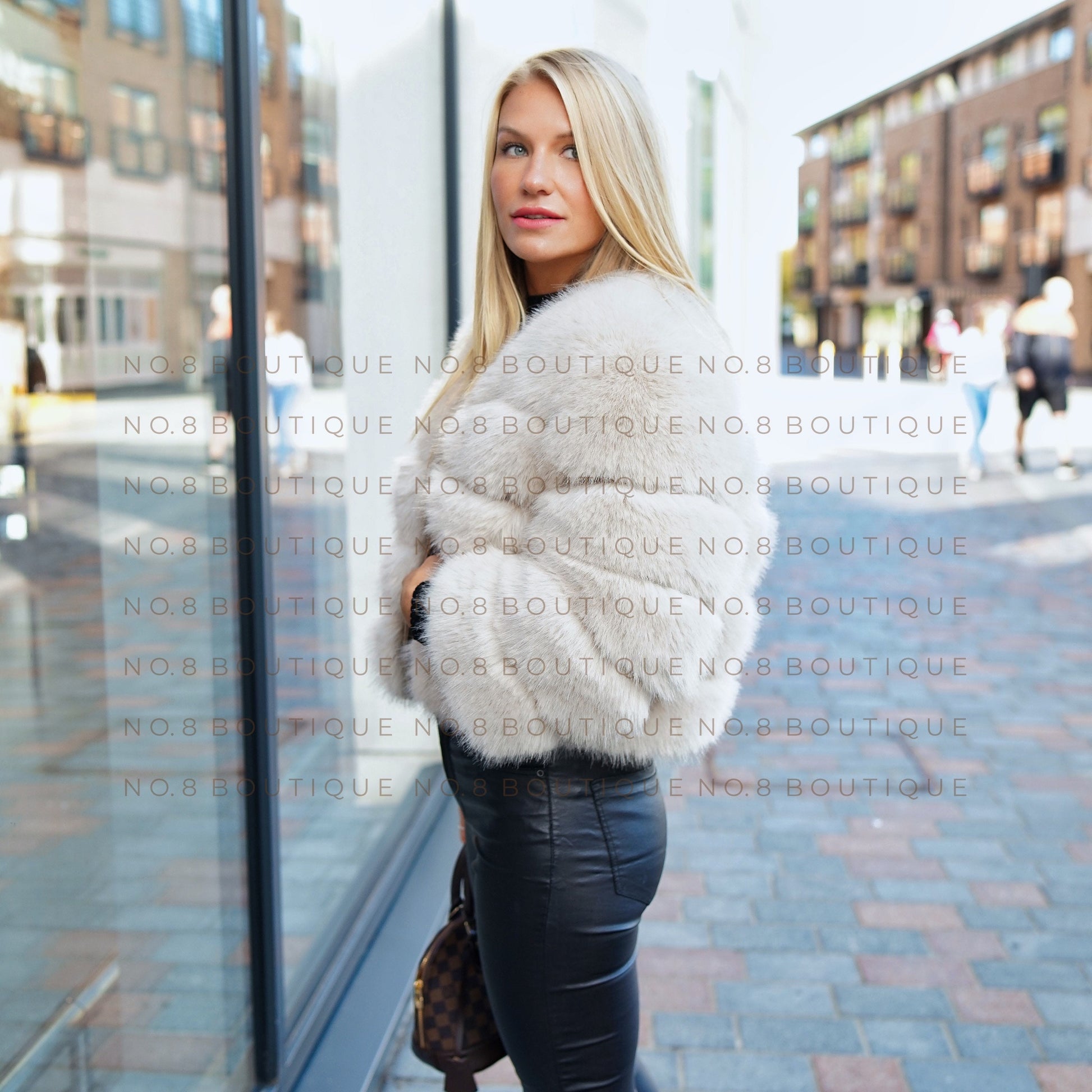 Casual beige faux fur jacket with five layered rows