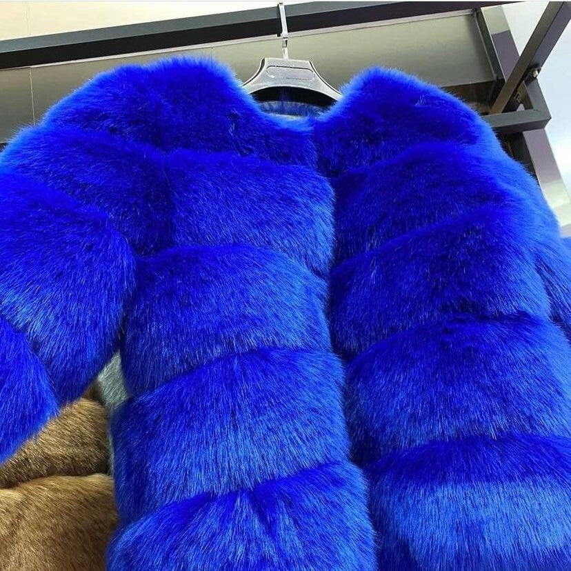 Chic classic faux fur jacket in striking sapphire blue with 5 rows