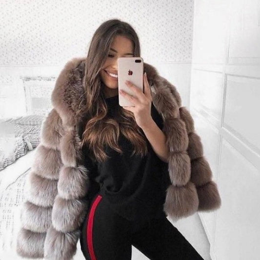 Classic hooded 5 row faux fur jacket.